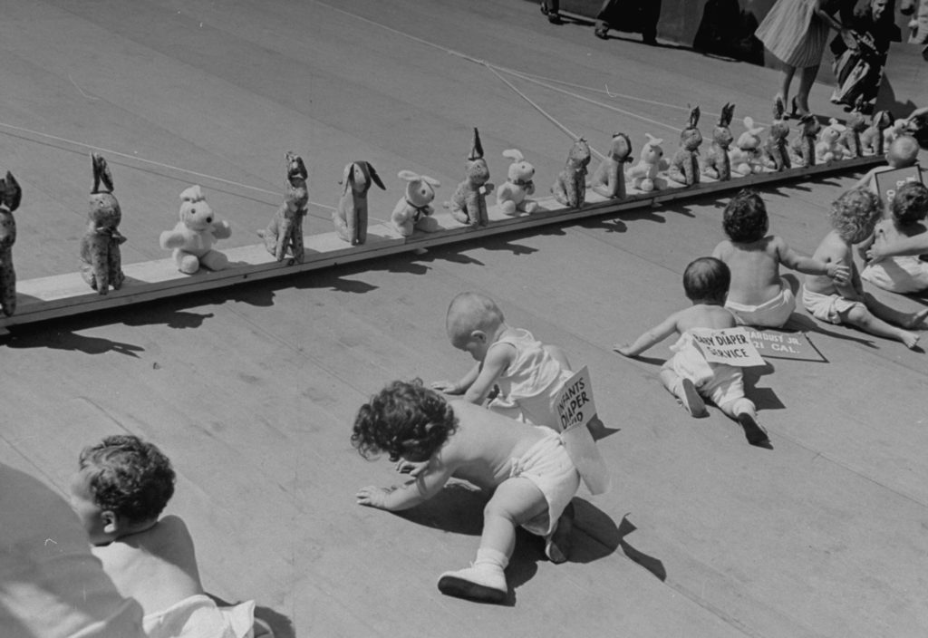 Babies crawling during the 8th annual Diaper Service Derby sponsored by the National Institute of Diaper Services. (Photo by Cornell Capa/The LIFE Picture Collection © Meredith Corporation)