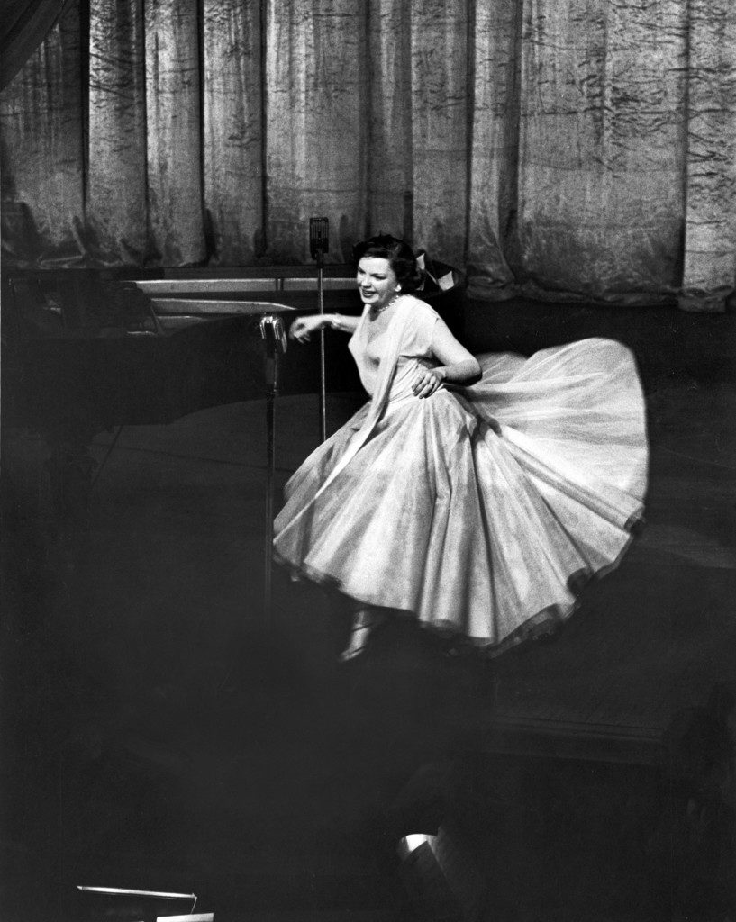 Actress/singer Judy Garland twirling into a dance step during a performance at the Paladium. (Photo by Cornell Capa/The LIFE Picture Collection © Meredith Corporation)