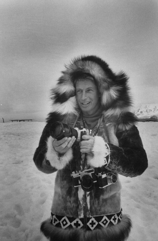 Stan Wayman with his camera taking photos of a Walrus hut. (Photo by Stan Wayman/The LIFE Picture Collection © Meredith Corporation)