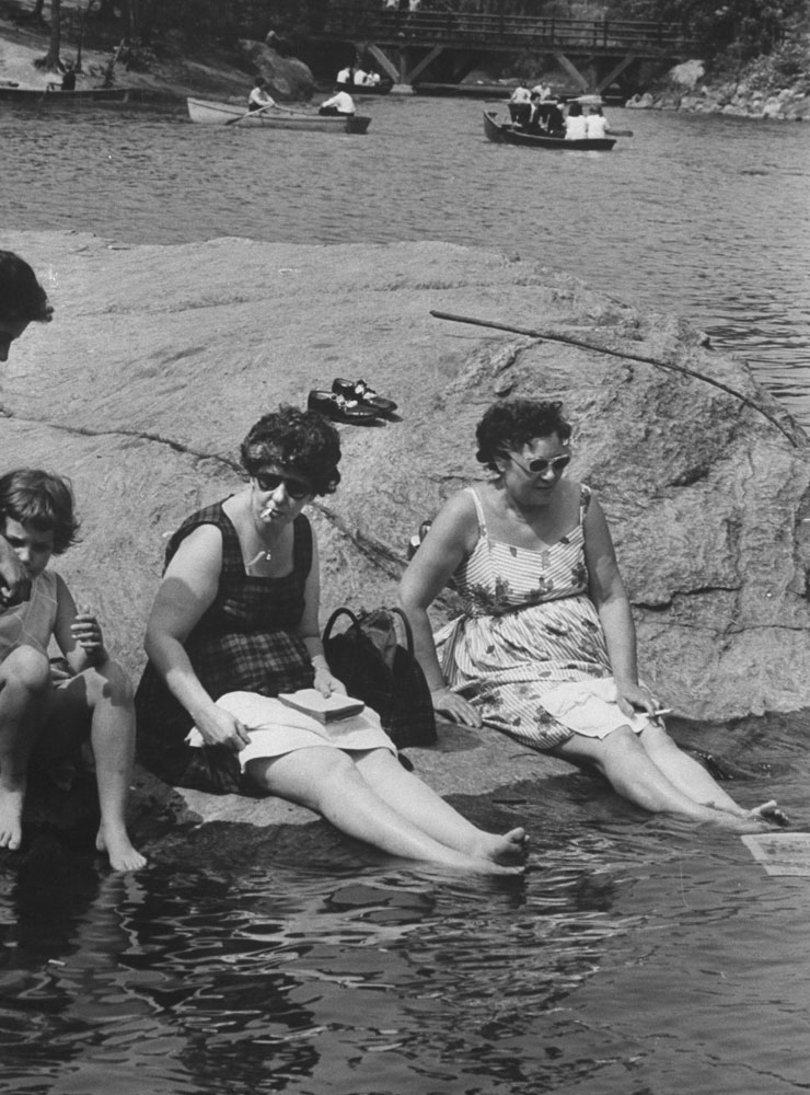 Sunbathers cool their feet, Central Park, 1961.