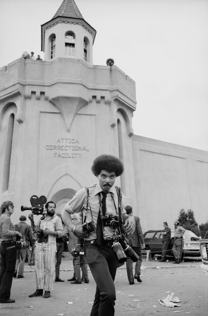 Photographer John Shearer on assignment outside Attica prison during a prisoner riot and uprising. (Photo by Bill Ray/The LIFE Picture Collection © Meredith Corporation)