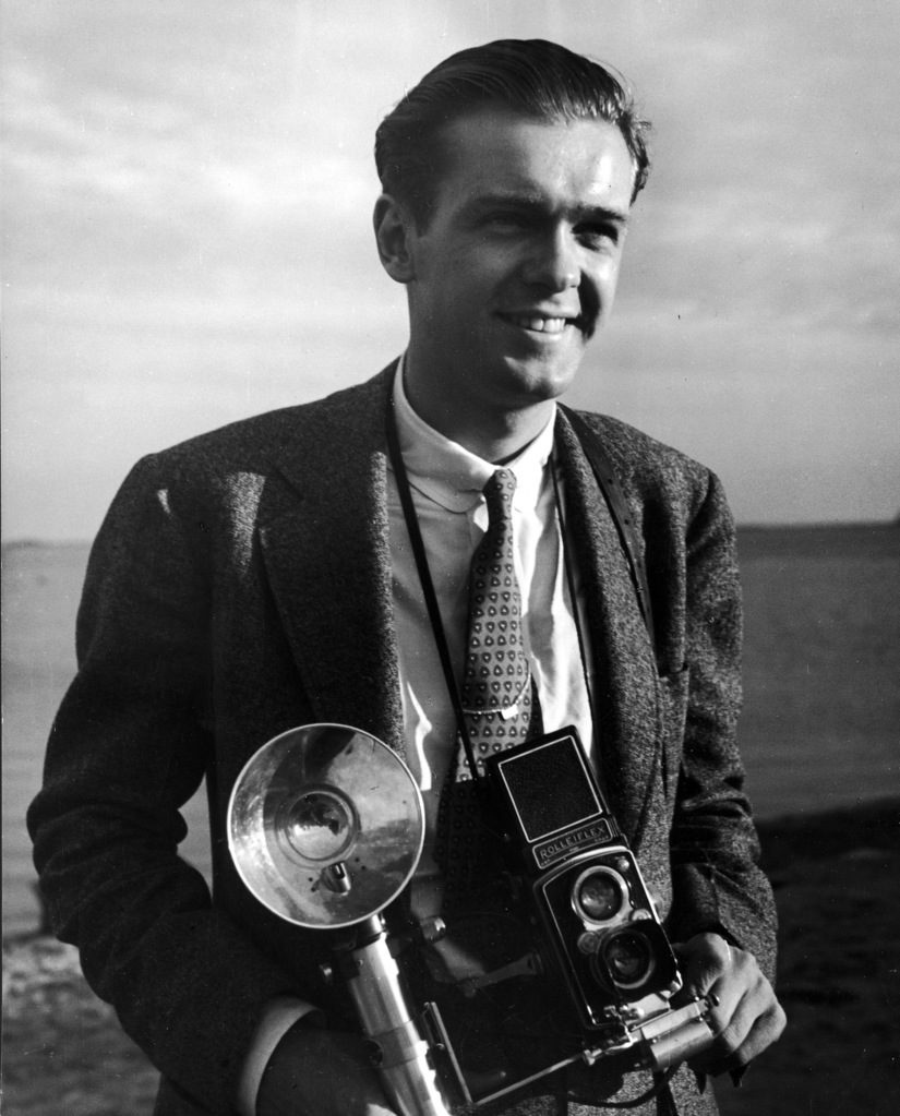 Portrait of photographer Walter B. Lane with his camera around his neck. (Photo by Alice Heidel /The LIFE Images Collection)