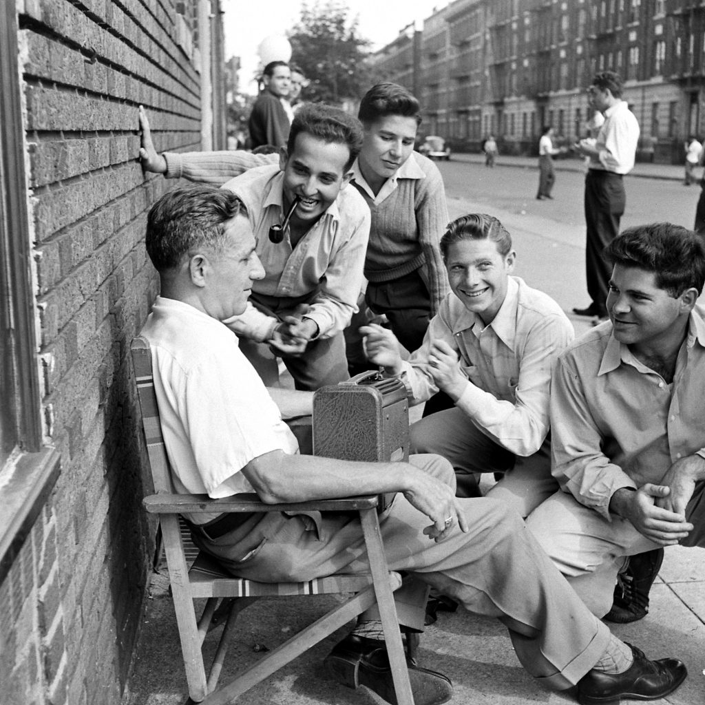 Listening to a Dodgers-Giants ballgame on the radio, Brooklyn, 1946.