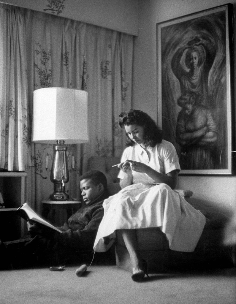 Sidney Poitier with his wife at home, 1959.