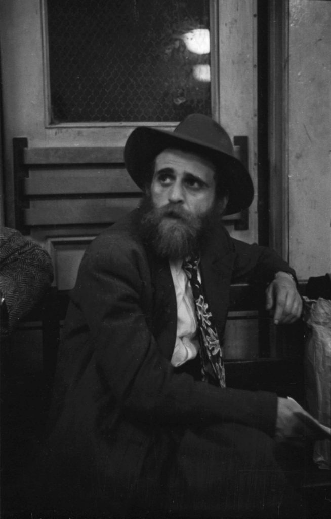 Twenty-four-year-old Schulim Pewzner, a rabbinical student from Warsaw, Poland, at Ellis Island, 1950.