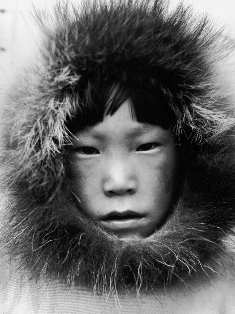 Closeup portrait of an Eskimo child in Tuktoyaktuk, Canada. (Photo by Margaret Bourke-White/The LIFE Picture Collection © Meredith Corporation)