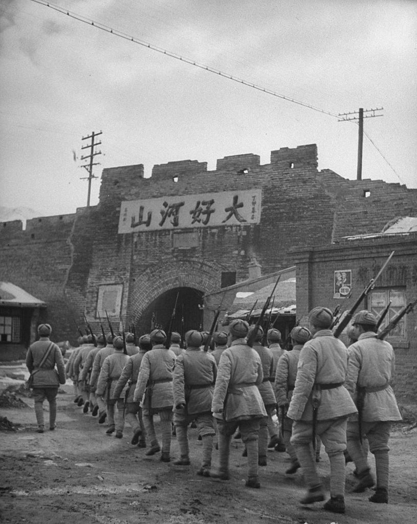 Communist soldiers marching through gates of Great Wall, 1946. (Photo by George Lacks/The LIFE Picture Collection © Meredith Corporation)