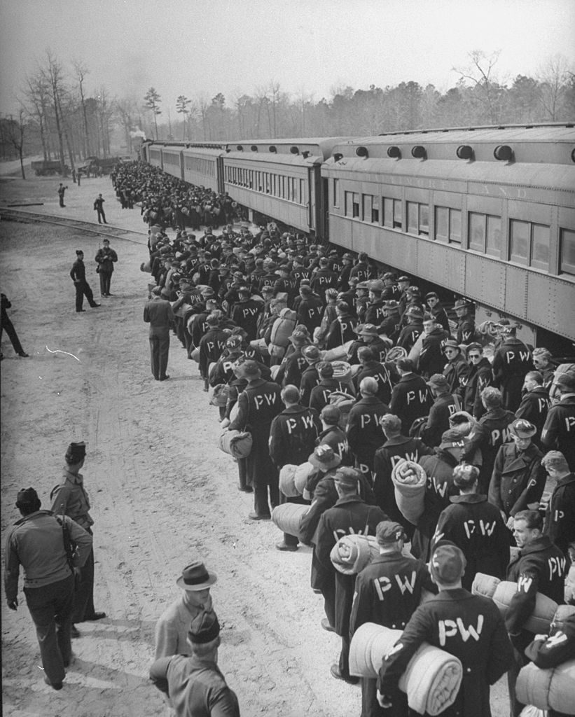A new group of POW's arriving at the Eustis Railroad for POW's to begin their orientation program during WWII. (Photo by Walter B. Lane/The LIFE Picture Collection © Meredith Corporation)