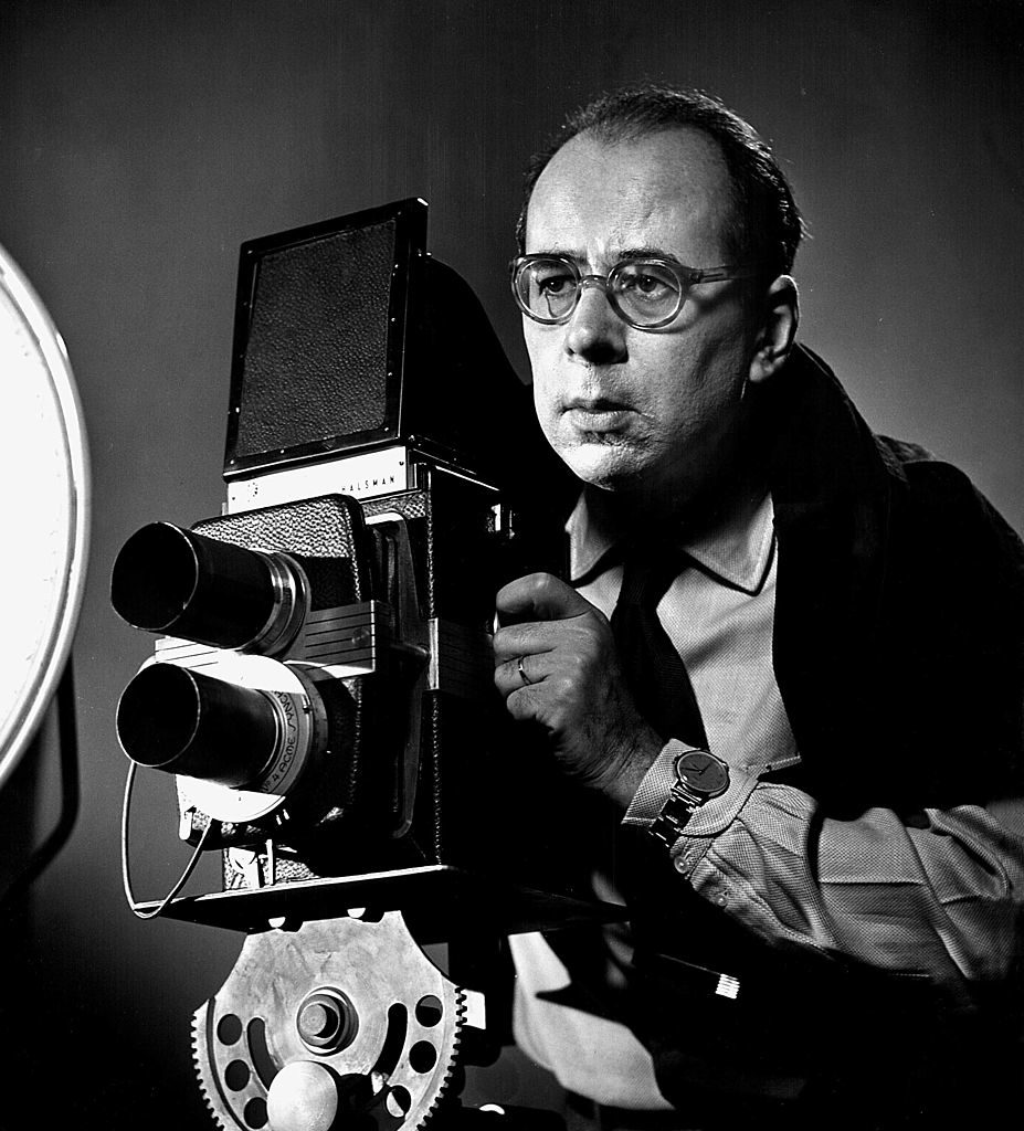 LIFE photographer Philippe Halsman poised w. camera in serious portrait. (Photo by Yale Joel/The LIFE Picture Collection © Meredith Corporation)