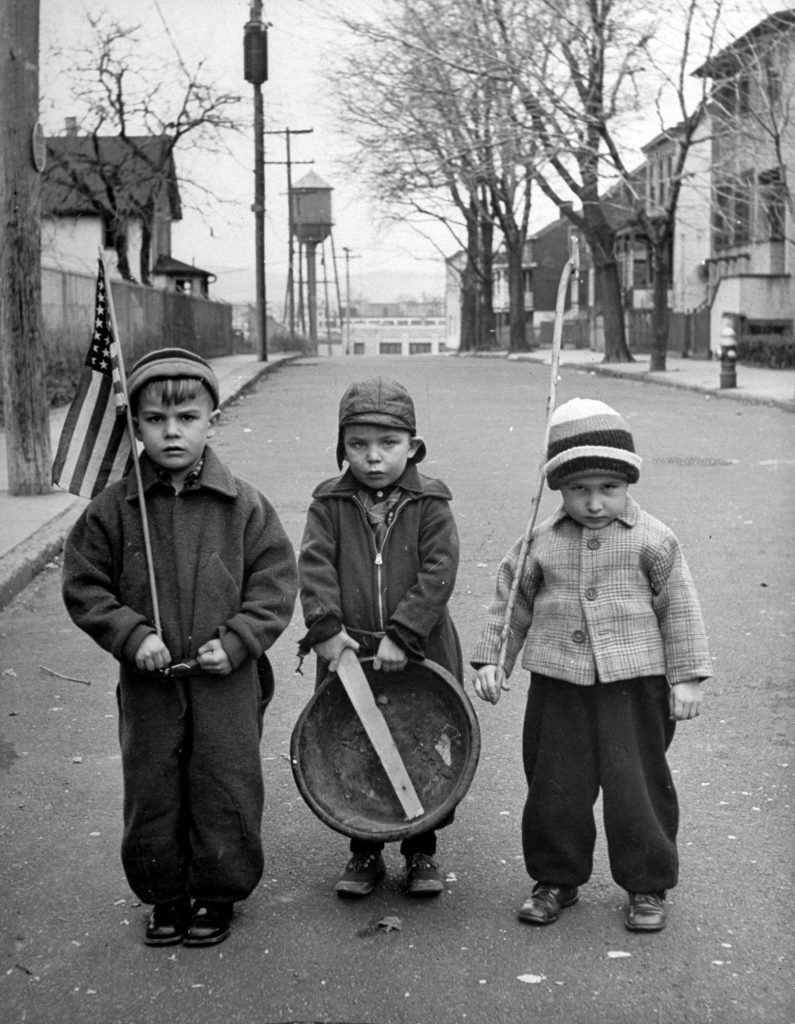 Children having military parade in street in Tarrytown, N.Y., 1944.