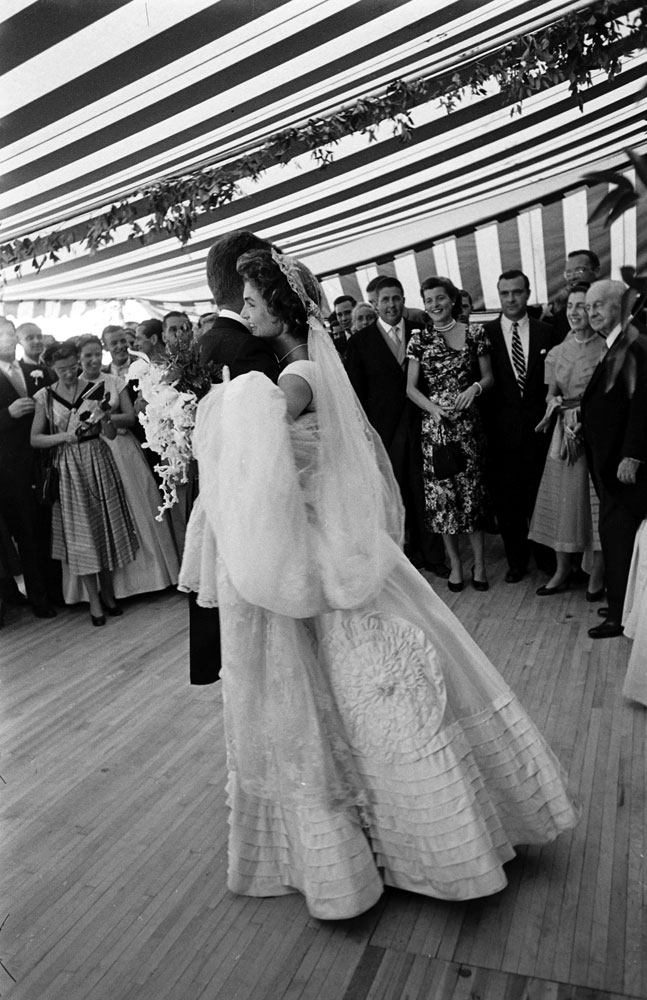 Jacqueline Kennedy dances with her husband, John F. Kennedy, at their wedding reception,