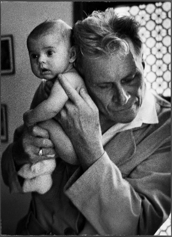 Blind doctor Albert A. Nast holding his ear to the back of a 3 month old instead of using a stethoscope. (Photo by Thomas McAvoy/The LIFE Picture Collection © Meredith Corporation)