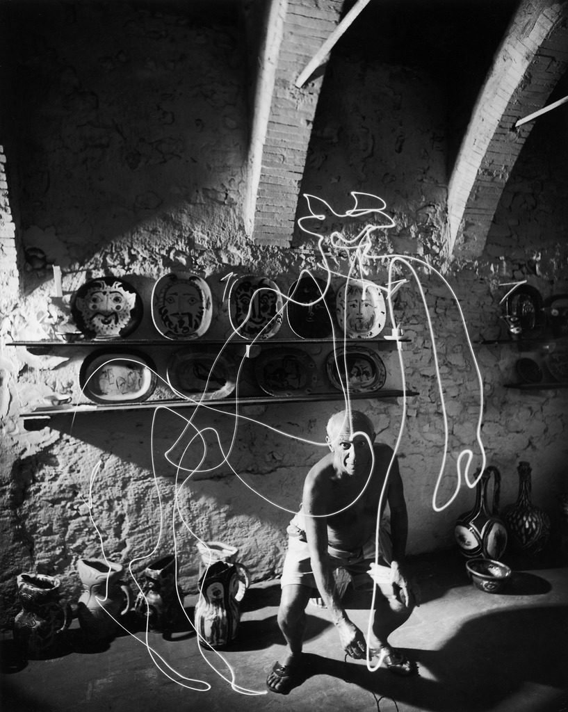 Artist Pablo Picasso using flashlight to make a light drawing in the air. (Photo by Gjon Mili/The LIFE Picture Collection © Meredith Corporation)