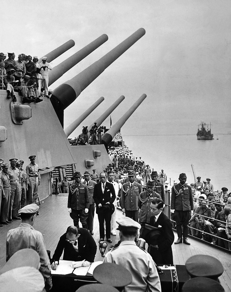 Allied officers and crew crowd the decks of US battleship Missouri. (Photo by Carl Mydans/The LIFE Picture Collection © Meredith Corporation)