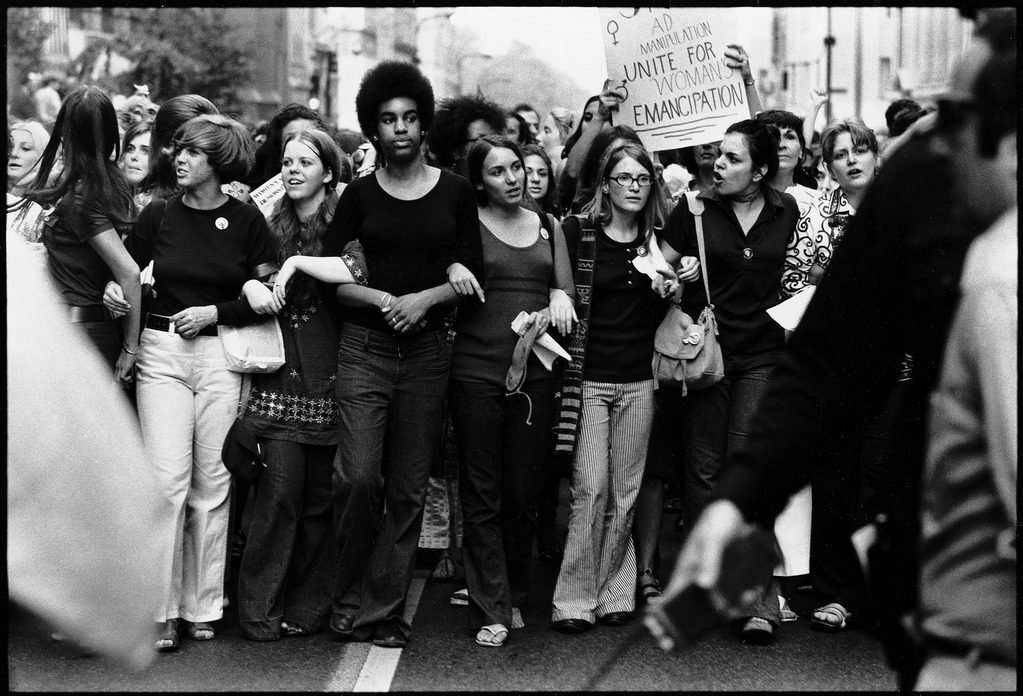 Women marching in New York at the Women's Strike for Equality, a march in celebration of the 50th anniversary of the Nineteenth Amendment to the Constitution. (Photo by John Olson/The LIFE Picture Collection © Meredith Corporation)