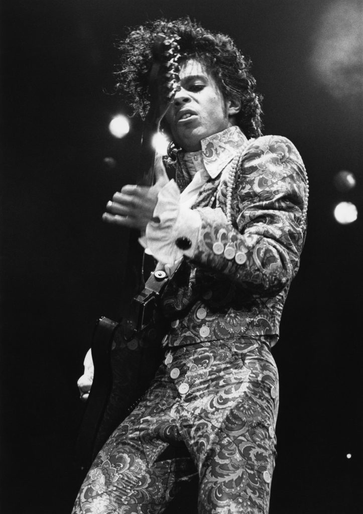 Musician Prince playing guitar during his Purple Rain tour. Long Beach, California, March 10, 1985.