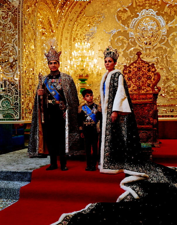 Shah of Iran, Mohamed Reza, posing with son Prince Reza and wife Farah wearing crown jewels and embroidered robes during coronation. (Photo by Dimitri Kessel/The LIFE Picture Collection © Meredith Corporation)