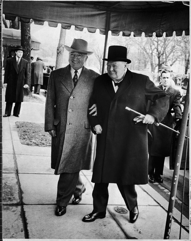 President Harry Truman walking arm-in-arm w. British Prime Minister Winston Churchill as he arrives at Blair House for his visit to discuss foreign affairs. (Photo by George Skadding/The LIFE Picture Collection © Meredith Corporation)