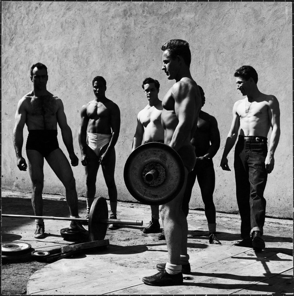 Prisoners at San Quentin weightlifting in prison yard during recreation period. (Photo by Charles Steinheimer/The LIFE Picture Collection © Meredith Corporation)