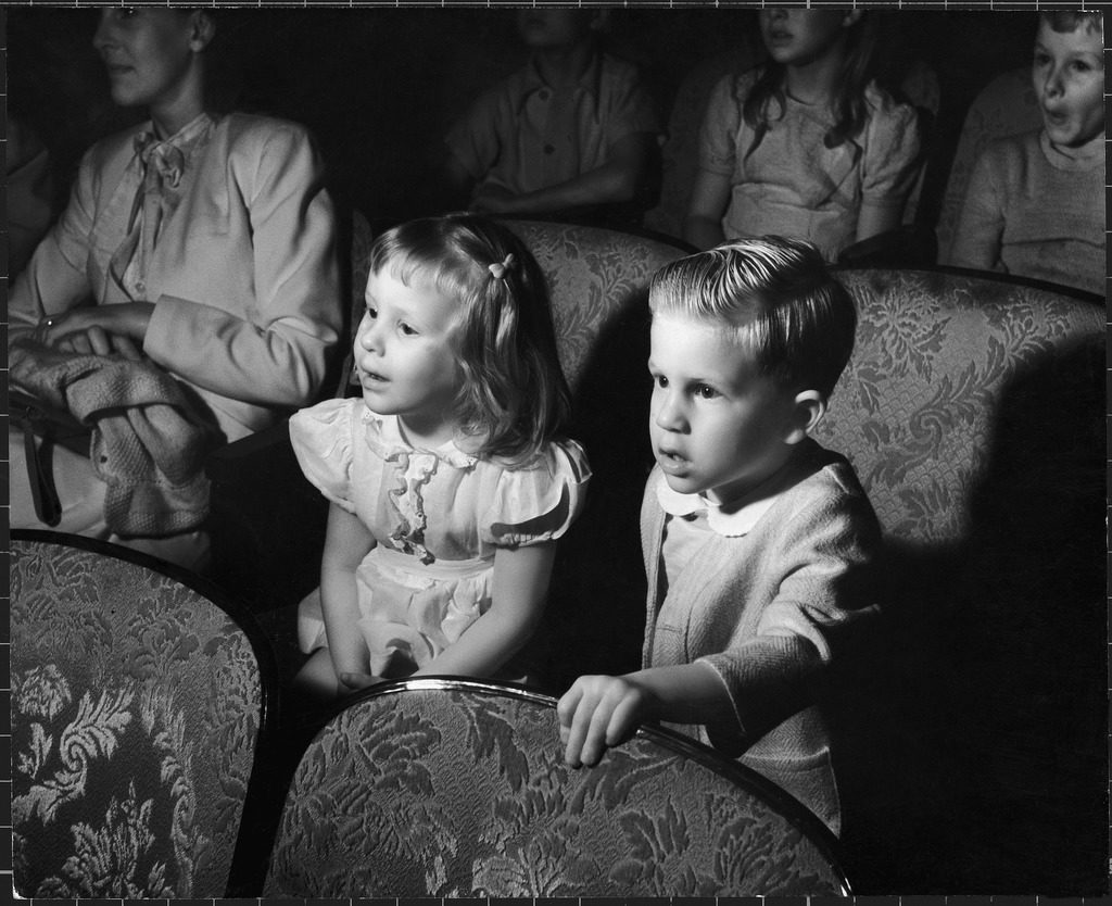 Children watching cartoons in a movie theater. (Photo by Charles Steinheimer/The LIFE Picture Collection © Meredith Corporation)