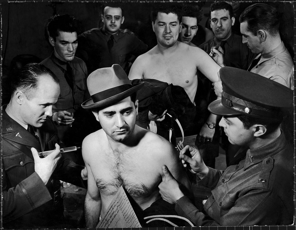 Draftee getting smallpox and typhoid inoculations in the first peacetime draft, Fort Dix, N.J., 1940. (Photo by George Strock/The LIFE Picture Collection © Meredith Corporation)
