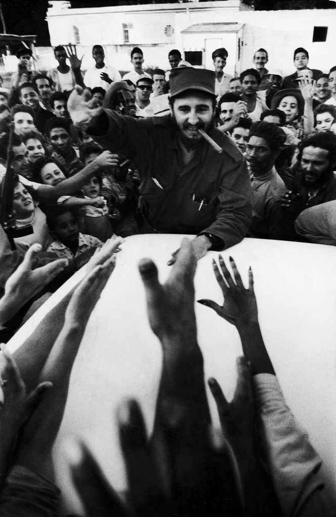 Rebel leader Fidel Castro being cheered by a village crowd on his victorious march to Havana. (Photo by Grey Villet/The LIFE Picture Collection © Meredith Corporation)